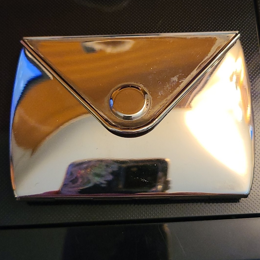 Pocket mirror made of highly polished Metal